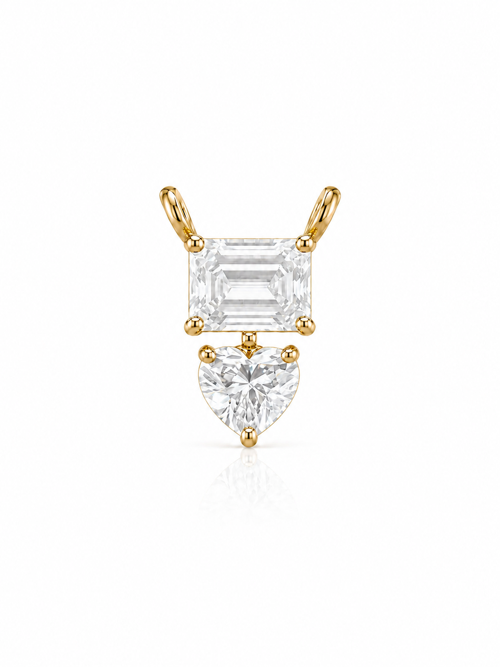 14k gold solitaire pendant adorned with emrald and heart lab grown diamonds