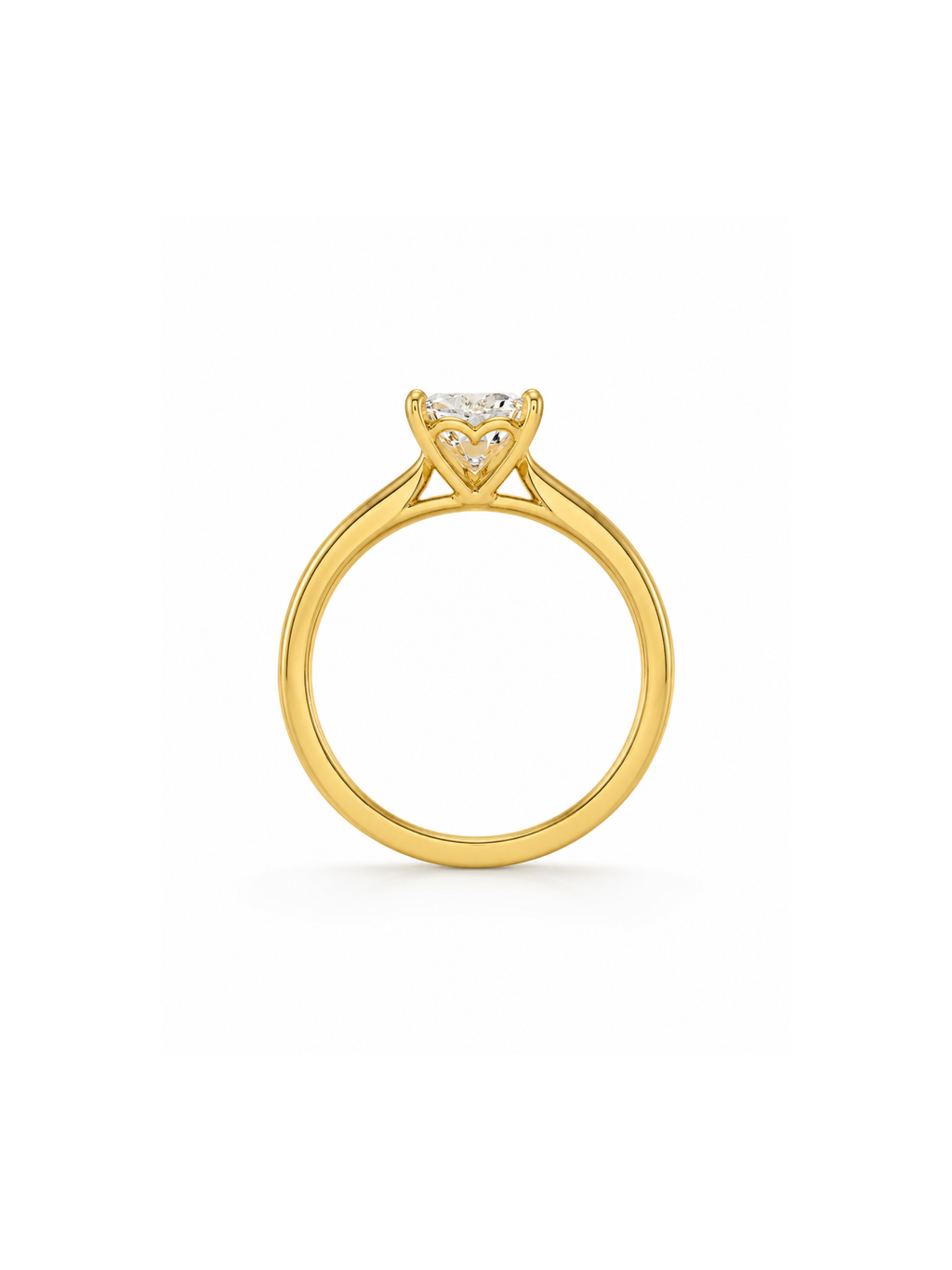 A yellow gold solitaire engagement ring featuring a small triangular cluster of clear stones under a round center stone, shown on a plain white background from brand elante