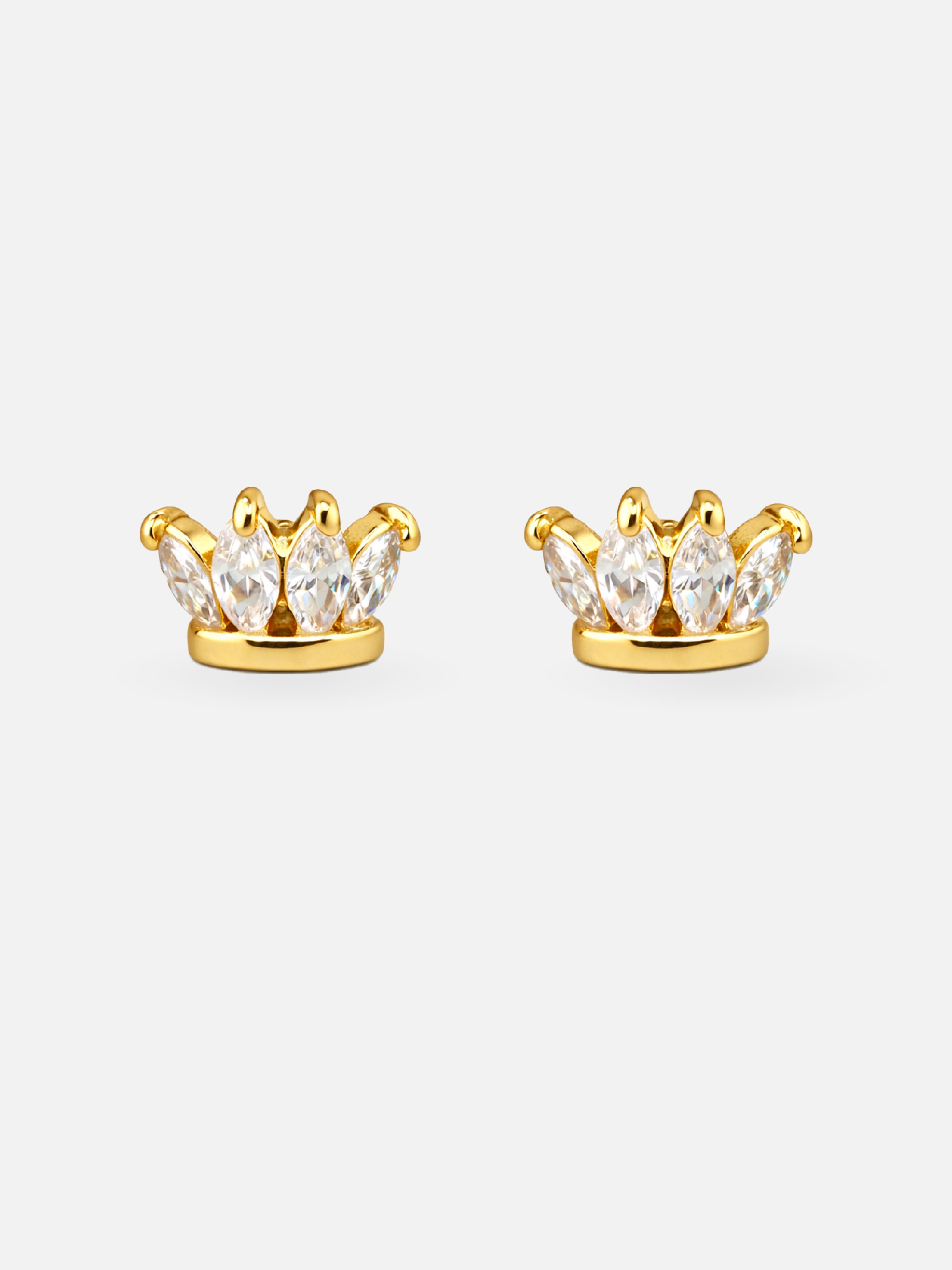 Gold crown-shaped earrings with clear gemstones on a white background
