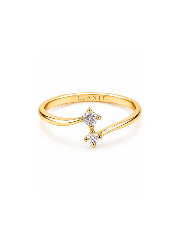 Gold ring with diamond accents on a white background, featuring the brand 'Elante'.